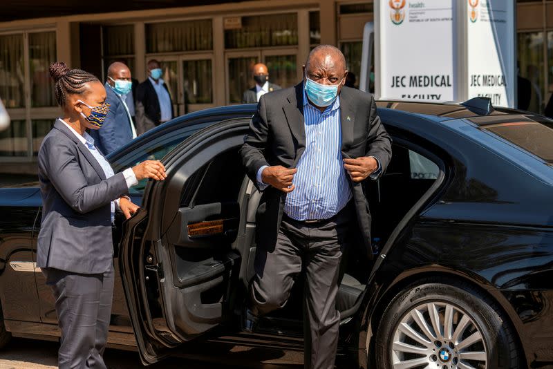 FILE PHOTO: South African President Cyril Ramaphosa visits the coronavirus disease (COVID-19) treatment facilities in Johannesburg