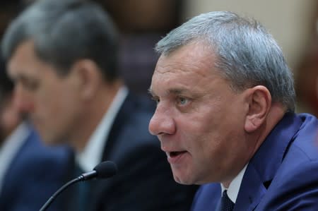 Russian Deputy Prime Minister Yury Borisov speaks during a meeting in Caracas