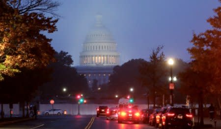FILE PHOTO: The U.S. Capitol building is seen at sunrise on the day of the U.S. midterm elections as voters go to the polls across the country to elect 33 U.S. senators and all 435 members of the U.S. House of Representatives in Washington, U.S., November 6, 2018. REUTERS/Jim Bourg/File Photo