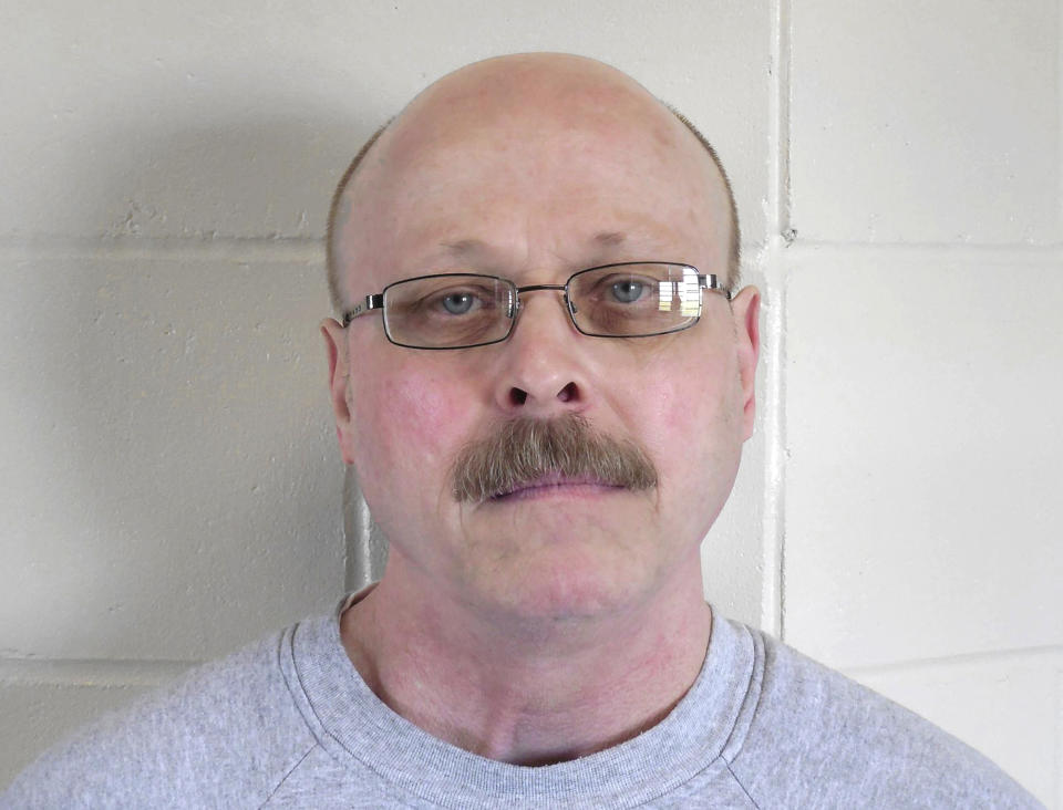 FILE - This file photo provided by the Nebraska Department of Correctional Services shows death-row inmate Carey Dean Moore. Nebraska prison officials are preparing to execute Moore on Tuesday, Aug. 14, 2018, for the 1979 murders of two Omaha cab drivers. The execution comes three years after Nebraska lawmakers voted to abolish capital punishment, but did an about-face driven largely by the state's Republican governor. (Nebraska Department of Correctional Services via AP, File)