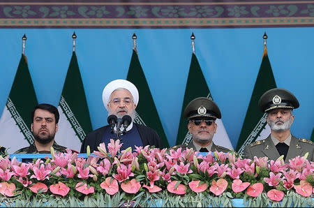 FILE PHOTO: Iranian President Hassan Rouhani delivers a speech during the ceremony of the National Army Day parade in Tehran, Iran April 18, 2019. Tasnim News Agency/via REUTERS