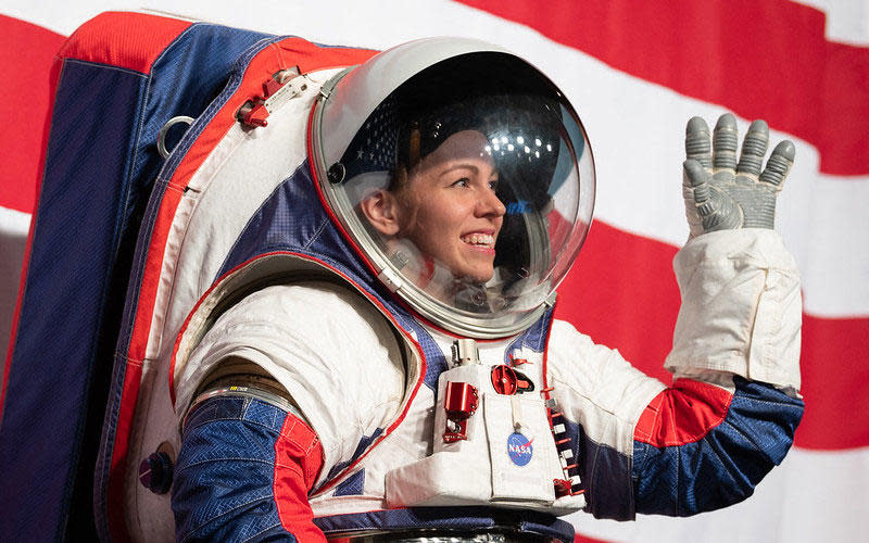 Spacesuit engineer Kristine Davis models a prototype of NASA's planned next-generation spacesuit in 2019 briefing.  / Credit: NASA