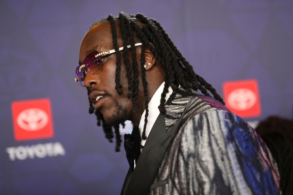 NFL draft prospect Darius Robinson, a defensive lineman from Missouri, walks the red carpet for NFL draft day at the Fox Theatre in Detroit on Thursday, April 25, 2024.