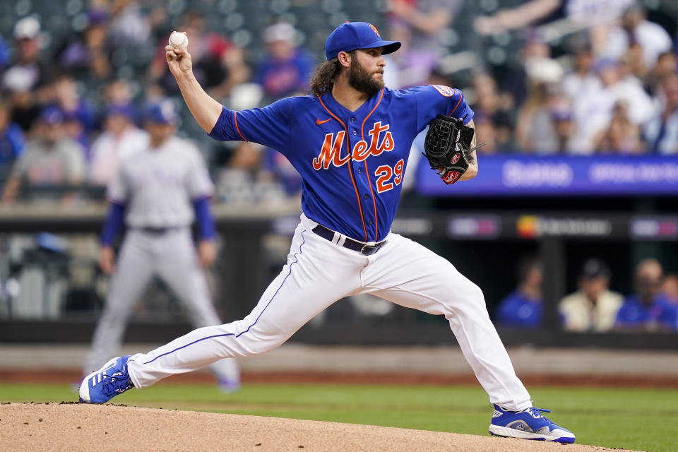 New York Mets starting pitcher Trevor Williams (29) throws in the first inning of a baseball game against the Texas Rangers, Saturday, July 2, 2022, in New York. (AP Photo/John Minchillo)