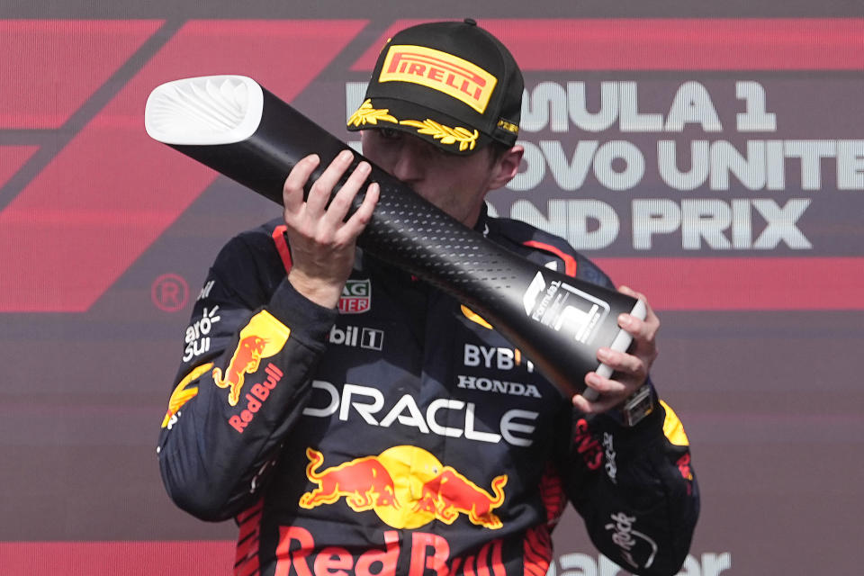 Red Bull driver Max Verstappen, of the Netherlands, celebrates on the podium after winning the Formula One U.S. Grand Prix auto race at Circuit of the Americas, Sunday, Oct. 22, 2023, in Austin, Texas. (AP Photo/Darron Cummings)