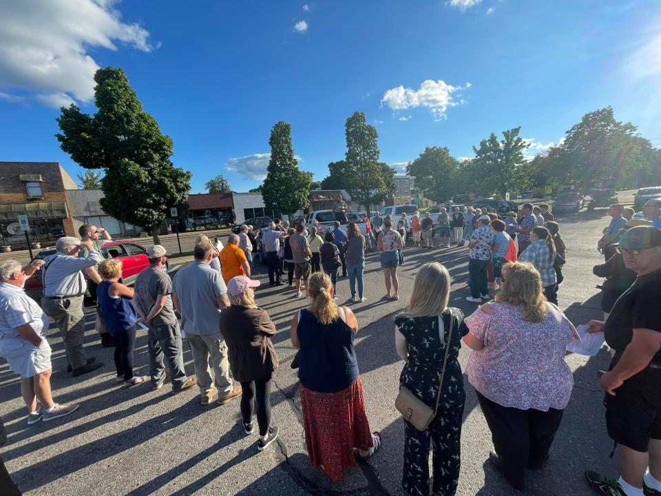 "Disavowed" precinct delegates gathered in the Midtown Parking Lot where Brent Leininger, standing in the bed of a pickup truck, called a convention to order to select 13 delegates to the Michigan GOP convention Aug. 26-27, 2022.