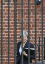 Britain's Prime Minister Theresa May leaves 10 Downing Street to give a statement to parliament in London, Monday, Oct. 22, 2018. May is urging Parliament to support her as Brexit looms, saying a divorce deal with the European Union is 95 percent complete.(AP Photo/Frank Augstein)