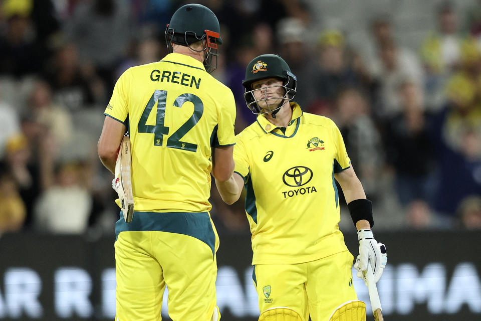 Australia's Steve Smith and Cameron Green celebrate their win after the first one-day international (ODI) cricket match between Australia and the West Indies at the Melbourne Cricket Ground (MCG) in Melbourne on February 2, 2024. (Photo by Martin KEEP / AFP) / -- IMAGE RESTRICTED TO EDITORIAL USE - STRICTLY NO COMMERCIAL USE -- (Photo by MARTIN KEEP/AFP via Getty Images)