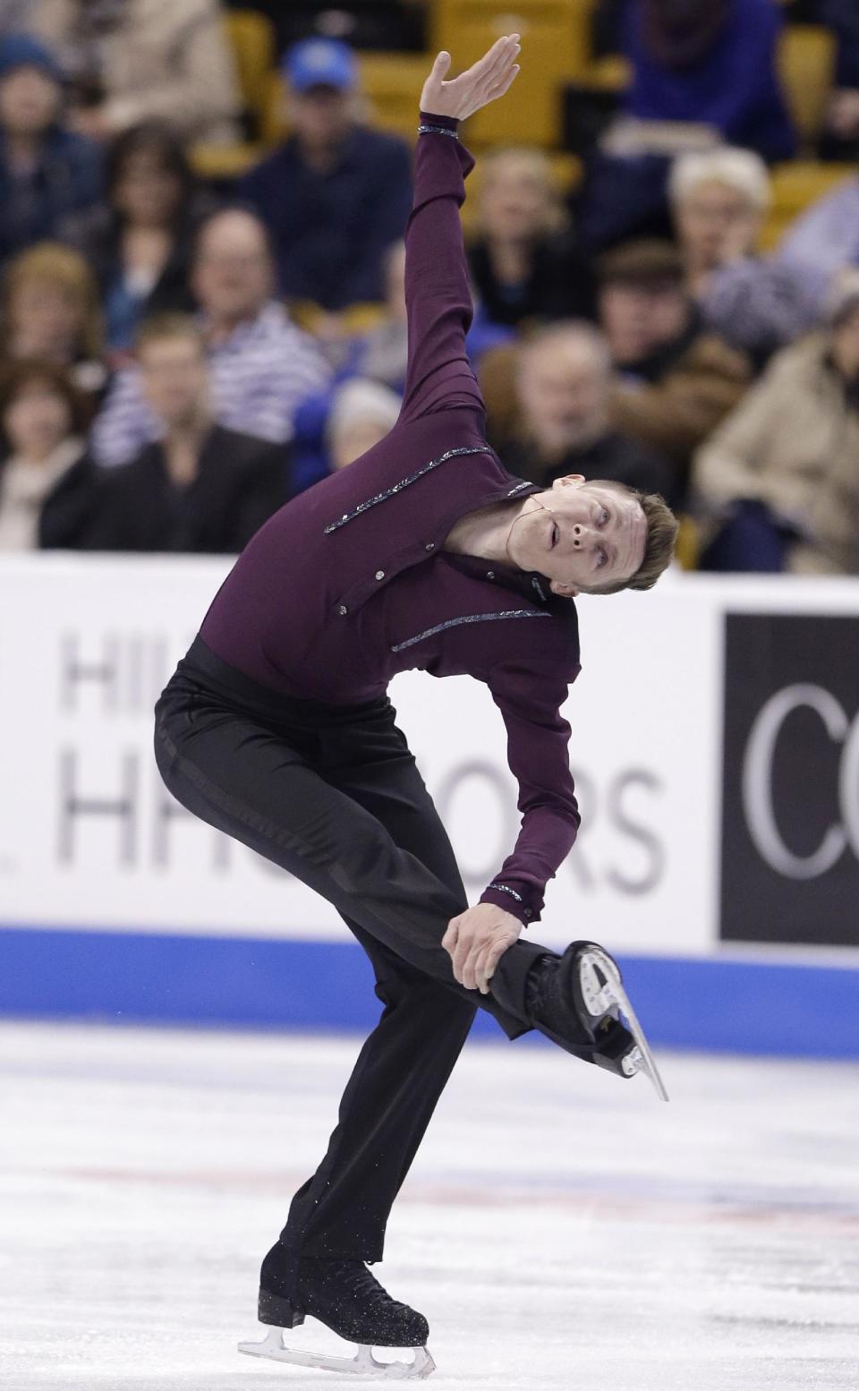 Jeremy Abbott performs during the men's short program at the U.S. Figure Skating Championships, Friday, Jan. 10, 2014, in Boston. (AP Photo/Steven Senne)