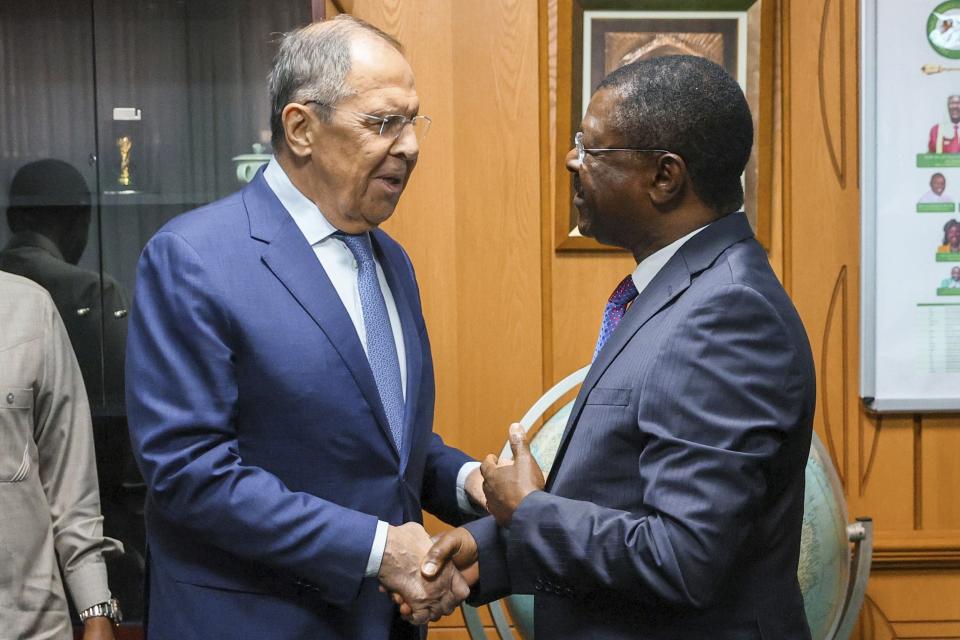 In this handout photo released by Russian Foreign Ministry Press Service, Speaker of the National Assembly of Kenya Moses Wetangula, right, and Russian Foreign Minister Sergey Lavrov shake hands prior to their talks in Nairobi, Kenya, on Monday, May 29, 2023. (Russian Foreign Ministry Press Service via AP)
