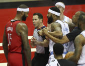 Los Angeles Lakers forward Markieff Morris, right, gets into an altercation with Houston Rockets center DeMarcus Cousins (15) during the first quarter of an NBA basketball game on Sunday, Jan. 10, 2021, at Toyota Center in Houston. Morris was ejected from the game after the incident. (Brett Coomer/Houston Chronicle via AP)