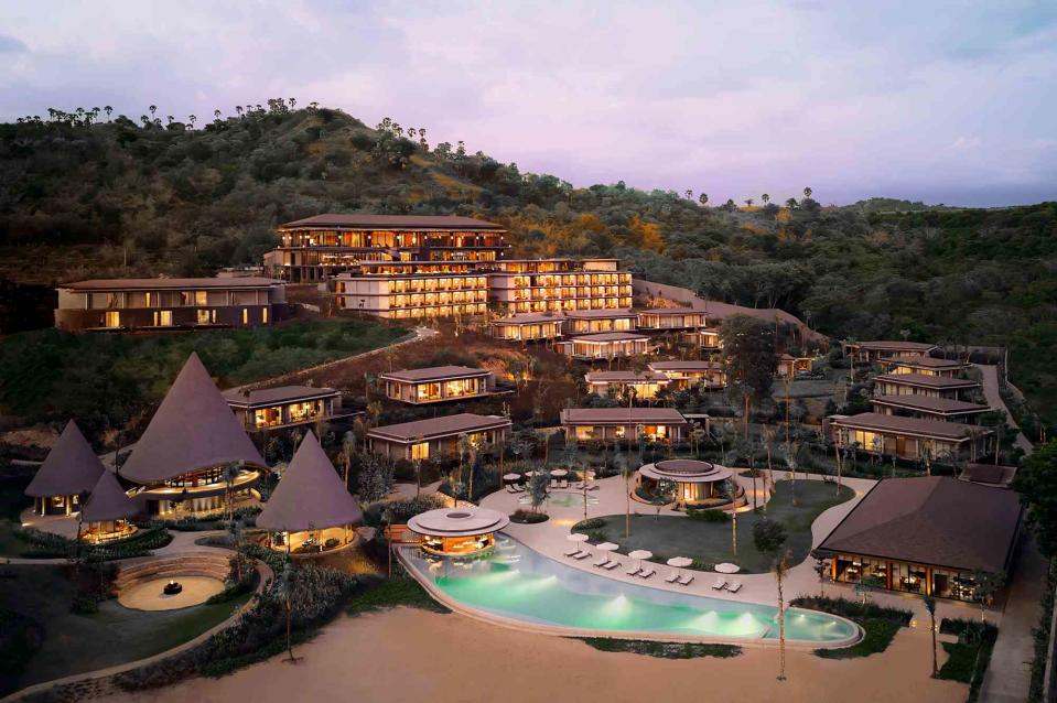 <p>Courtesy of TA’AKTANA, a Luxury Collection Resort & Spa, Labuan Bajo</p> TA’AKTANA resort and spa in Labuan Bajo, Indonesia, during sunset.