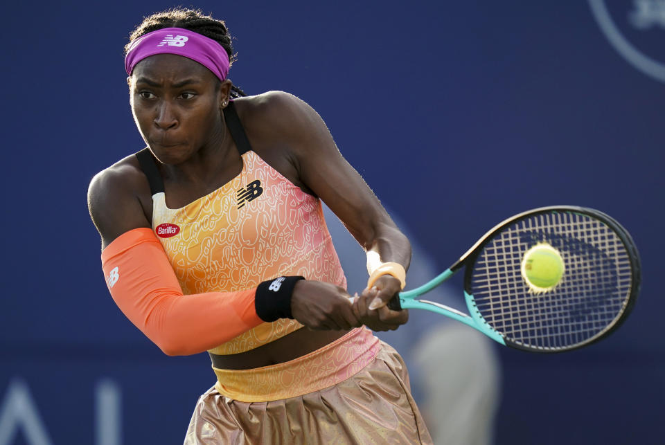 Coco Gauff, of the United States, hits a return to Naomi Osaka, of Japan, at the Mubadala Silicon Valley Classic tennis tournament in San Jose, Calif., Thursday, Aug. 4, 2022. (AP Photo/Godofredo A. Vásquez)