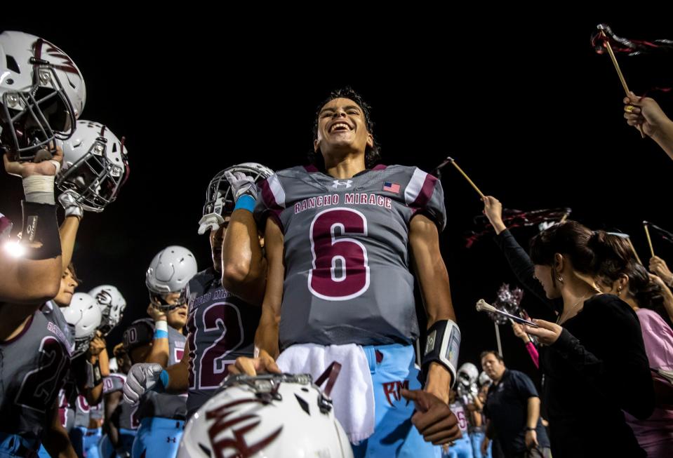 Rancho Mirage's Yanni Padilla (6) celebrates with his team after their win over La Quinta in Rancho Mirage, Calif., Friday, Oct. 20, 2023.