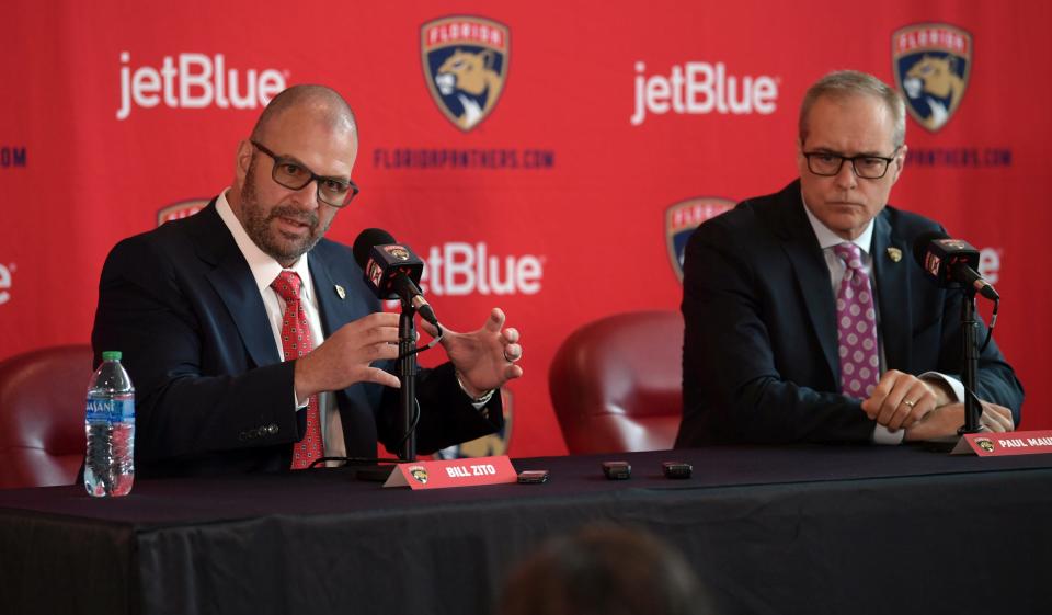 Bill Zito, left, general manager of the Florida Panthers, and Paul Maurice, new head coach of the Panthers, take questions during an NHL hockey news conference at FLA Live Arena, Thursday, June 23, 2022, in Sunrise, Fla. (AP Photo/Jim Rassol)