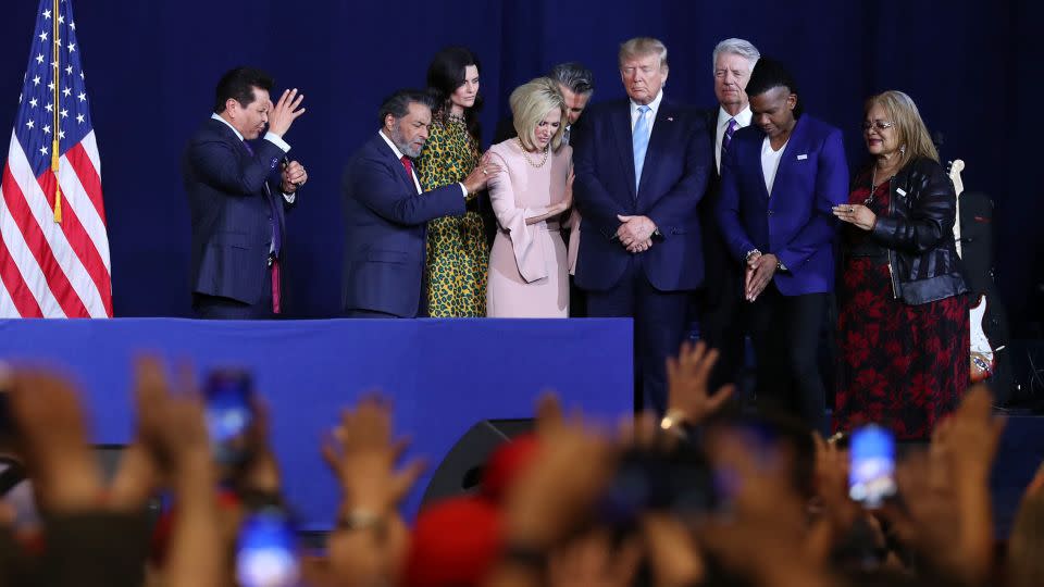 Faith leaders pray over President Donald Trump during an "Evangelicals for Trump'"campaign event on January 3, 2020, in Miami, Florida. - Joe Raedle/Getty Images