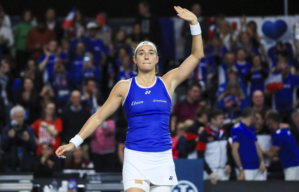 France's Caroline Garcia reacts after her side win the Billie Jean King Cup qualifying match between Great Britain and France at the Coventry Building Society Arena, Coventry, England, Saturday April 15, 2023. (Bradley Collyer/PA via AP)