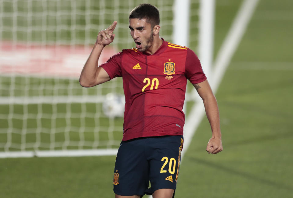 Spain's Ferran Torres celebrates after scoring his team's fourth goal during the UEFA Nations League soccer match between Spain and Ukraine at the Estadio Alfredo Di Stefano stadium in Madrid, Spain, Sunday, Sept. 6, 2020. (AP Photo/Bernat Armangue)