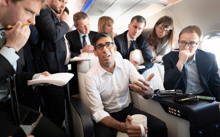 Prime Minister Rishi Sunak holds a huddle with political journalists on board a government plane as he heads to Japan to attend the G7 summit in Hiroshima - Stefan Rousseau /PA