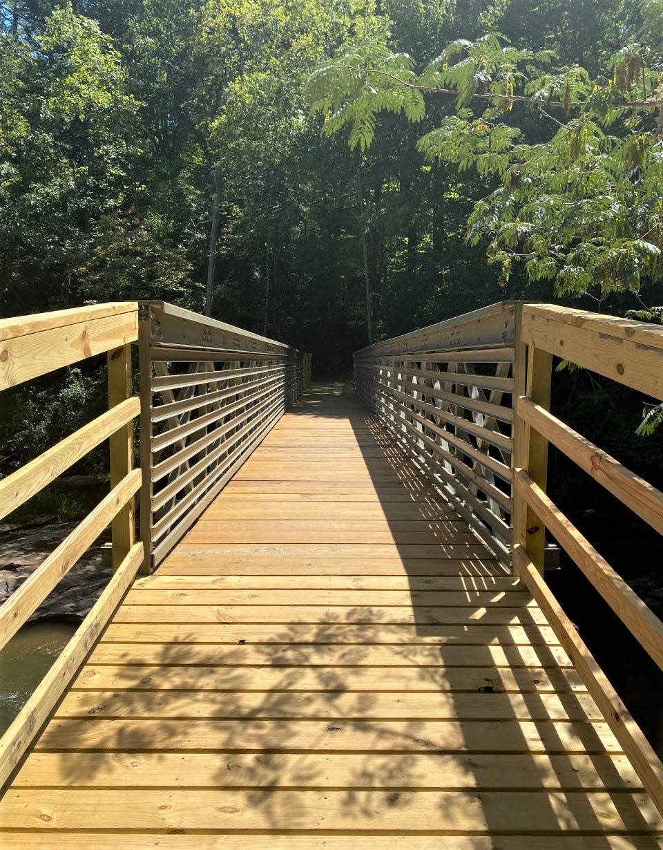 A new bridge over Fairforest Creek is open at Croft State Park, reconnecting 20 miles of hiking and biking trails in the Southside Trail system and completing the portion of the Palmetto Trail that runs through the park.