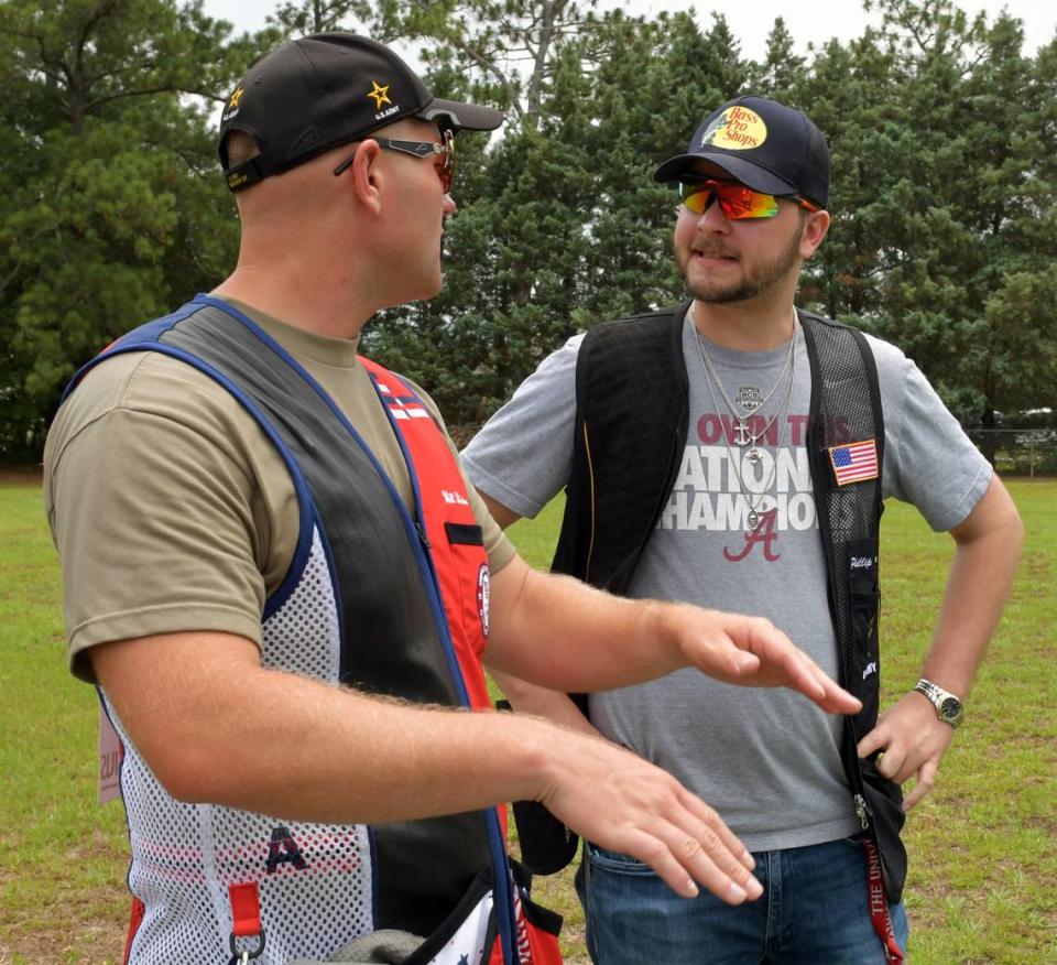 Sgt. Will Hinton, left, talks with Ledger-Enquirer reporter Kelby Hutchison prior to shooting trap at Ft. Moore. 07/02/2024