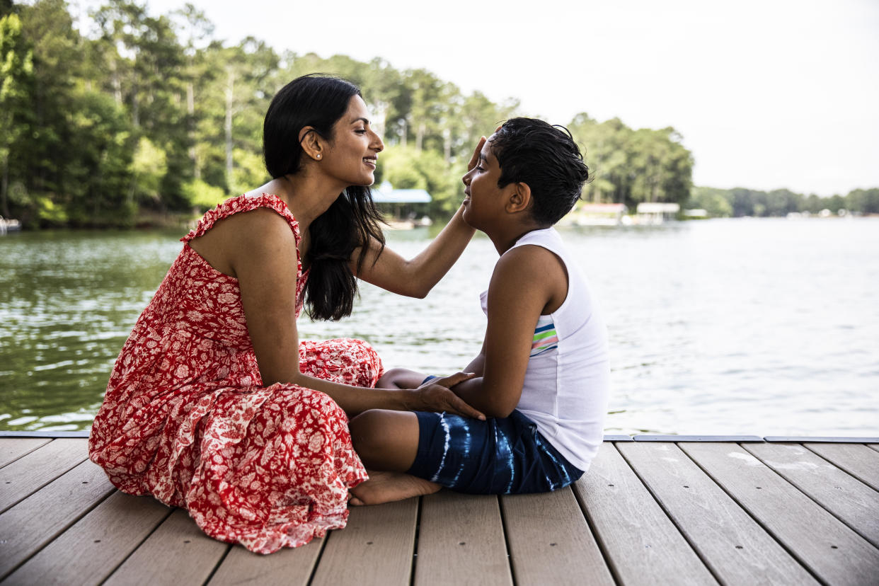 Experts says that parents don't need to label their caregiving style — but knowing certain buzzwords can have its advantages. (Photo: Getty Creative)