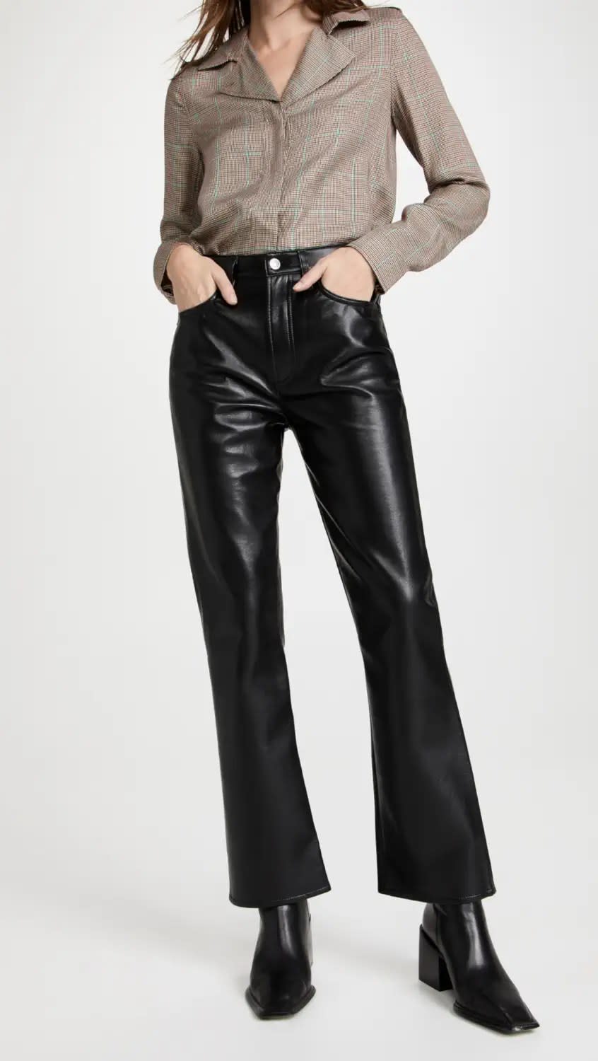 model wearing blouse with black leather pants