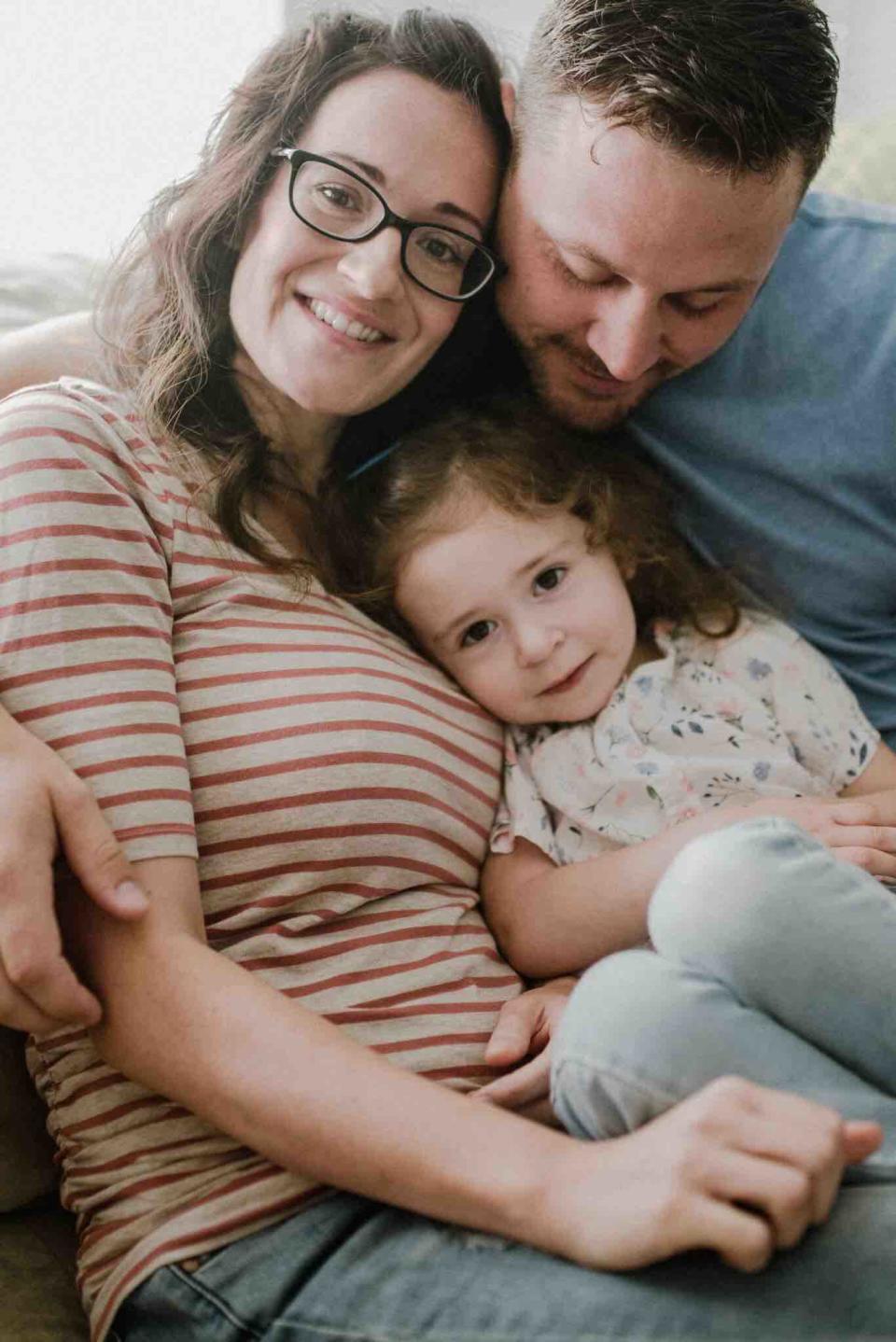 Sabrina Lauman, her husband Brent, and their 2-year-old daughter. Image via Facebook.