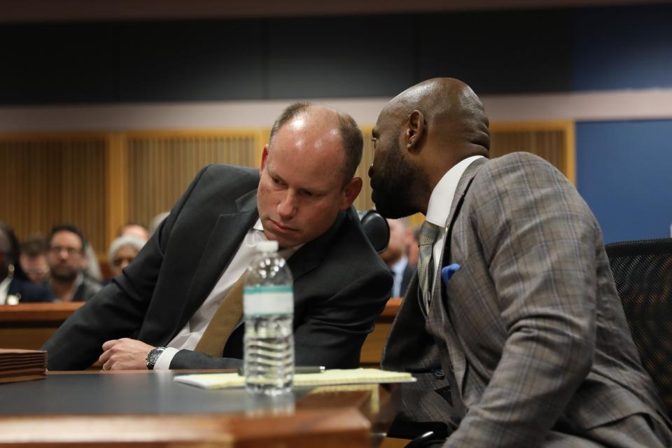 ATLANTA, GA - FEBRUARY 15: Fulton County Special Prosecutor Nathan Wade talks with his attorney Andrew Evans during a hearing in the case of the State of Georgia v. Donald John Trump at the Fulton County Courthouse on February 15, 2024 in Atlanta, Georgia. The court is hearing testimony as to whether DA Fanni Willis and Wade should be disqualified from the case for allegedly lying about a personal relationship. (Photo by Alyssa Pointer-Pool/Getty Images)