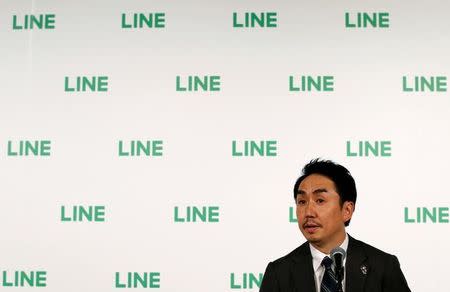 Line Corp Chief Executive Officer Takeshi Idezawa attends a news conference to mark the company's debut on the Tokyo Stock Exchange and the New York Stock Exchange, in Tokyo, Japan July 15, 2016. REUTERS/Toru Hanai