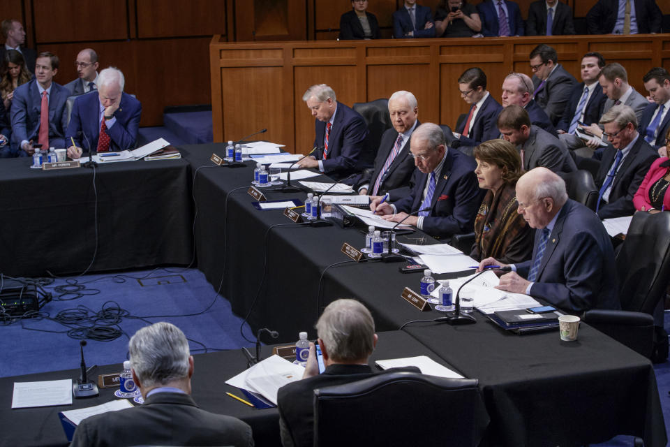 The Senate Judiciary Committee meets to advance the nomination of President Donald Trump's Supreme Court nominee Neil Gorsuch to fill the vacancy left by the late Antonin Scalia, Monday, April 3, 2017, on Capitol Hill in Washington. Top, from left are, Sen. John Cornyn, R-Texas, Sen. Lindsey Graham, R-S.C., Sen. Orrin Hatch, R-Utah, Committee Chairman Sen. Charles Grassley, R-Iowa, the Committee's ranking member Sen. Dianne Feinstein, D-Calif. and Sen. Patrick Leahy, D-Vt. (AP Photo/J. Scott Applewhite)