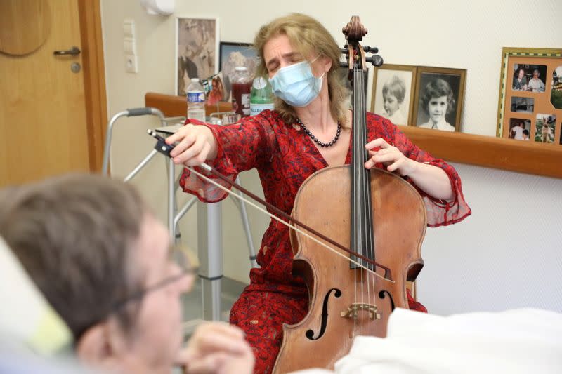 Cellist plays music for patients in end-of-life care home, in Paris