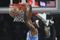 Los Angeles Clippers guard Terance Mann (14) dunks during the first half of an NBA basketball game against the Minnesota Timberwolves in Los Angeles, Saturday, Nov. 13, 2021. (AP Photo/Kyusung Gong)