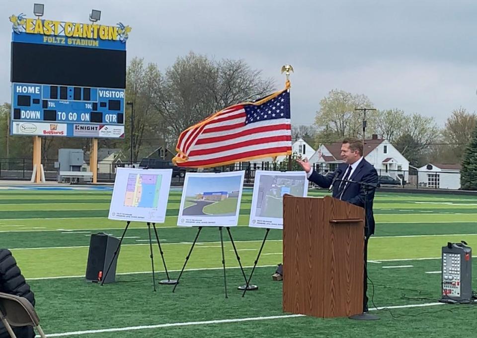 Osnaburg Local Superintendent Kevin Finefrock talks about the construction of Foltz Fieldhouse during a ground-breaking ceremony for the complex in April at Foltz Field in East Canton.