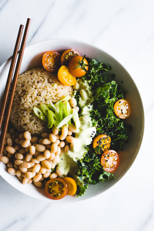 <p>Parsley Vegan</p><p>This recipe for green Thai curry brown rice bowls is a mix of beans, kale, rice and green curry—all in an explosion of delicious Thai flavors.</p><p><strong>Get the recipe: <a href="http://www.parsleyvegan.com/green-thai-curry-brown-rice-bowl/" rel="nofollow noopener" target="_blank" data-ylk="slk:Green Thai Curry Brown Rice Bowls;elm:context_link;itc:0;sec:content-canvas" class="link ">Green Thai Curry Brown Rice Bowls</a></strong></p>