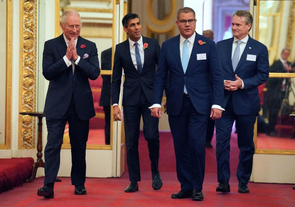 King Charles III, Rishi Sunak, Alok Sharma and Brian Moynihan, chair and CEO of Bank of America and co-chair of Sustainable Markets Initiative, attend a reception for world leaders ahead of Cop27 (POOL/AFP via Getty Images)