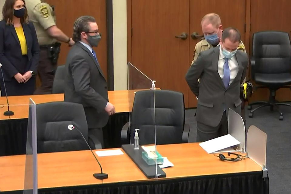 Former Minneapolis police officer Derek Chauvin is handcuffed to be led away after a jury found him guilty of all charges in his trial for second-degree murder, third-degree murder and second-degree manslaughter in the death of George Floyd in Minneapolis, Minnesota, U.S. April 20, 2021 in a still image from video.  Court TV/Pool via Reuters)