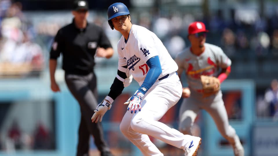 Ohtani stalls at second base after hitting a double during the first inning of a game against the St. Louis Cardinals. - Sean M. Haffey/Getty Images