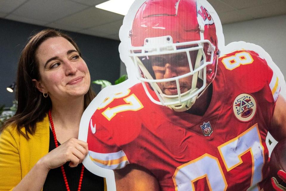 Elizabeth Brown, a Kansas City Chiefs fan, poses for a photo with a life-size cutout of Kansas City Chiefs tight end Travis Kelce on Monday, Feb. 5, 2024, in Guymon, Okla. Kelce is Brown’s favorite player.