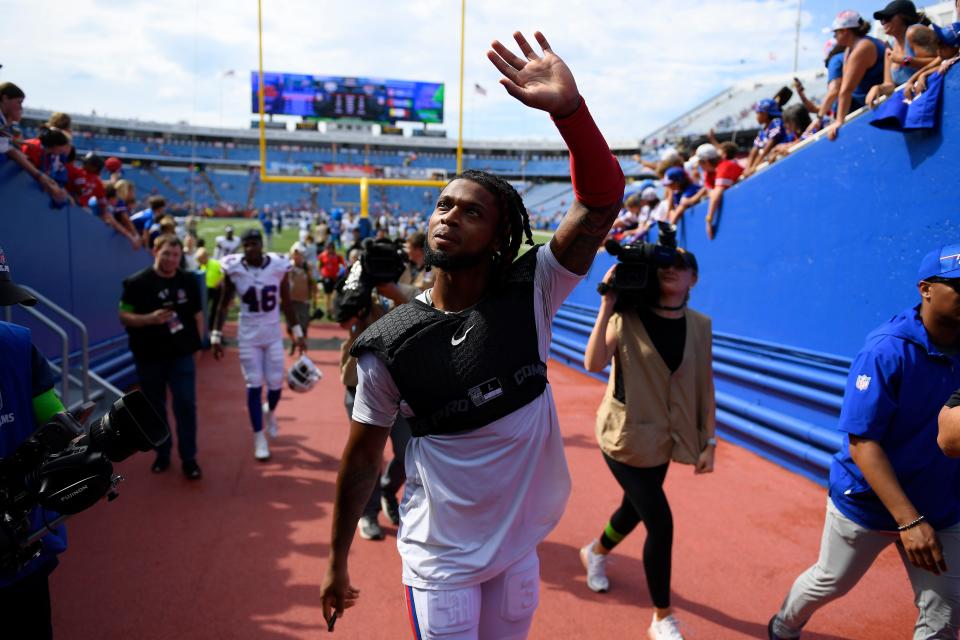 Buffalo Bills safety Damar Hamlin waves to fans after an NFL preseason football game against the Indianapolis Colts in Orchard Park, New York, Saturday, Aug. 12, 2023.