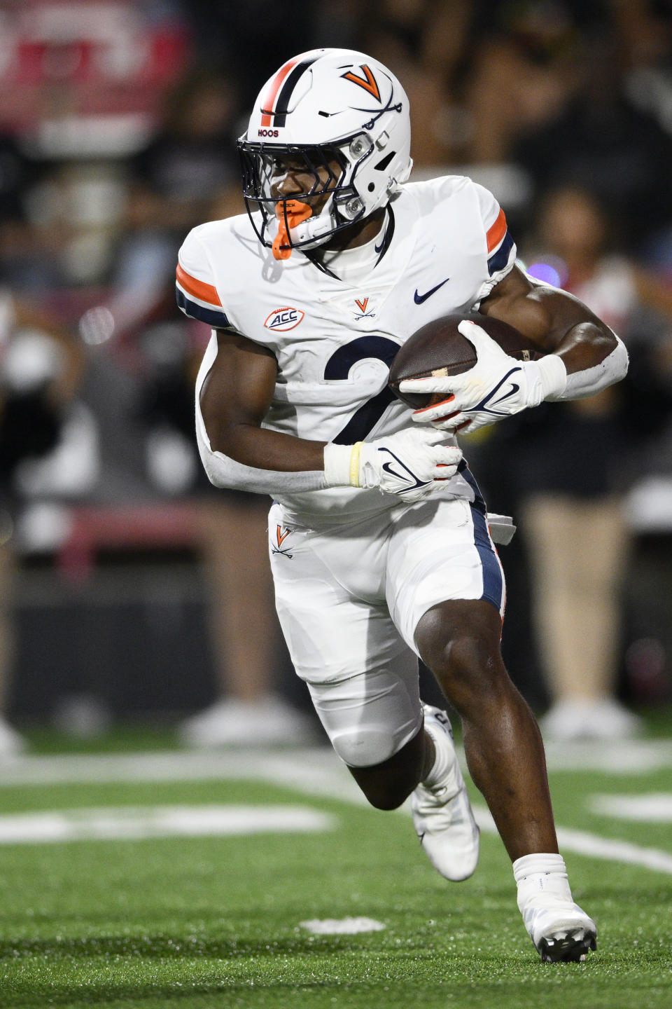 Virginia running back Perris Jones carries during the first half of the team's NCAA college football game against Maryland, Friday, Sept. 15, 2023, in College Park, Md. (AP Photo/Nick Wass)