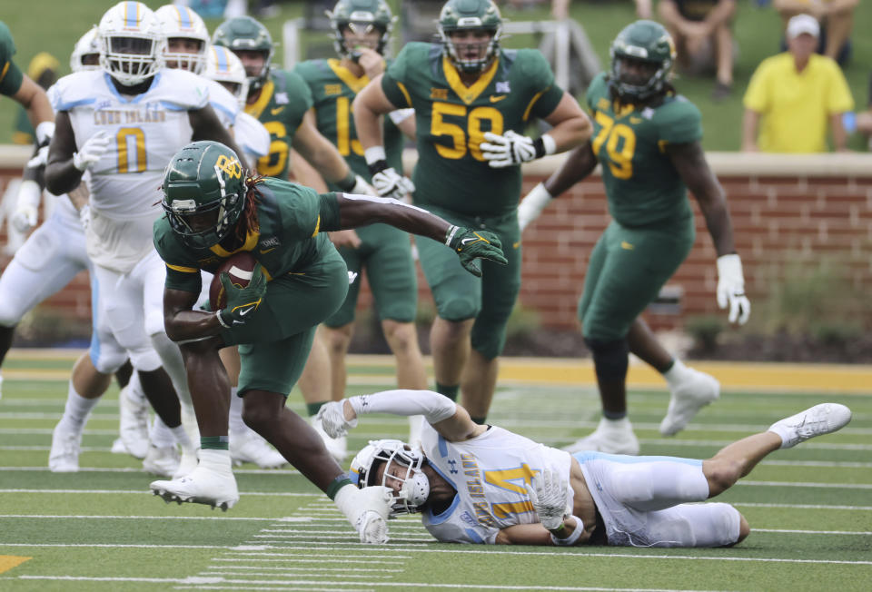 Baylor wide receiver Ketron Jackson Jr. slips past Long Island defensive back Jai Roe on a pass play during the first half of an NCAA college football game, Saturday, Sept. 16, 2023, in Waco, Texas. (Rod Aydelotte/Waco Tribune-Herald via AP)