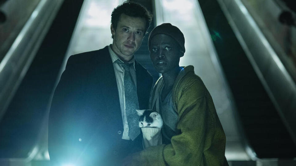 Lupita Nyong’o and Joseph Quinn with Frodo in <em>A Quiet Place: Day One.</em>