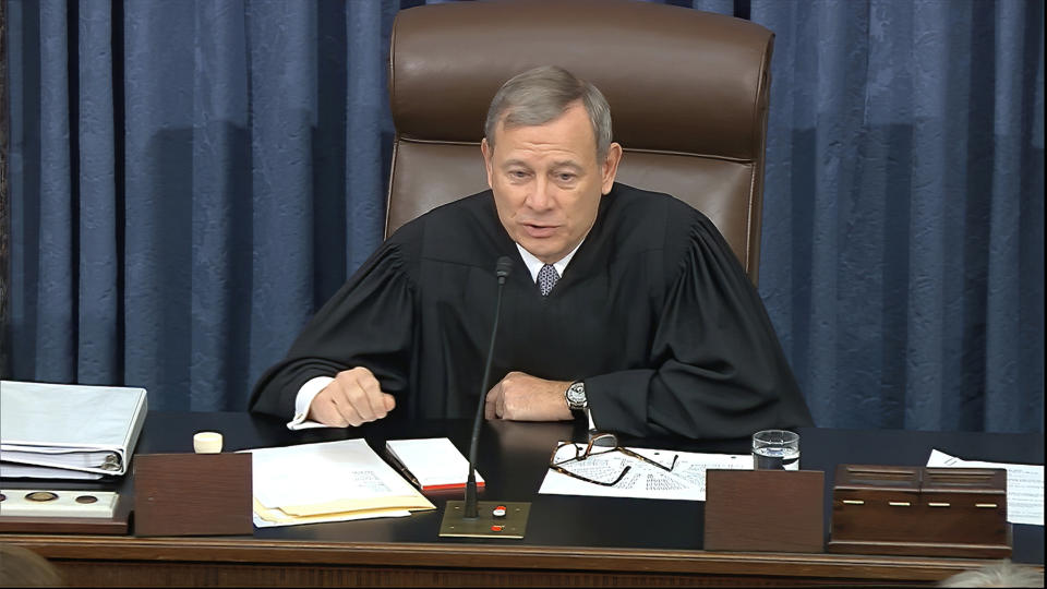 In this image from video, presiding officer Chief Justice of the United States John Roberts tells senators they should no longer address their questions to specific people during the impeachment trial against President Donald Trump in the Senate at the U.S. Capitol in Washington, Thursday, Jan. 30 2020. (Senate Television via AP)