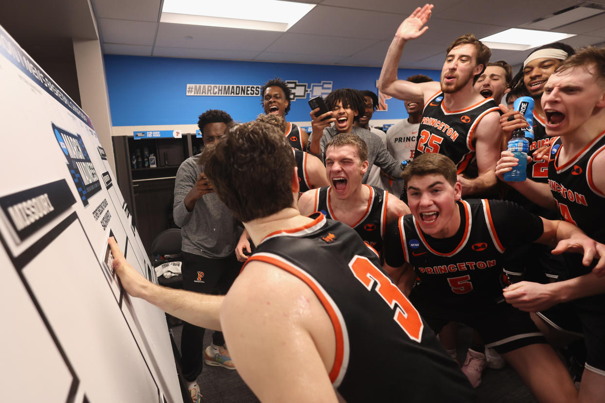 SACRAMENTO, CA - MARCH 18: Princeton Tigers players celebrate in the locker room after a win against the Missouri Tigers during the second round of the 2023 NCAA Men's Basketball Tournament held at Golden 1 Center on March 18, 2023 in Sacramento, California. (Photo by Jed Jacobsohn/NCAA Photos via Getty Images)