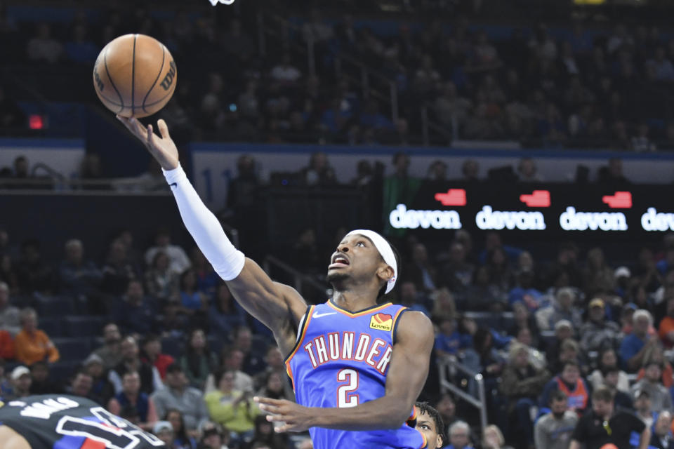 Oklahoma City Thunder guard Shai Gilgeous-Alexander shoots in the first half of an NBA basketball game against the Detroit Pistons, Monday, Oct. 30, 2023, in Oklahoma City. (AP Photo/Kyle Phillips)