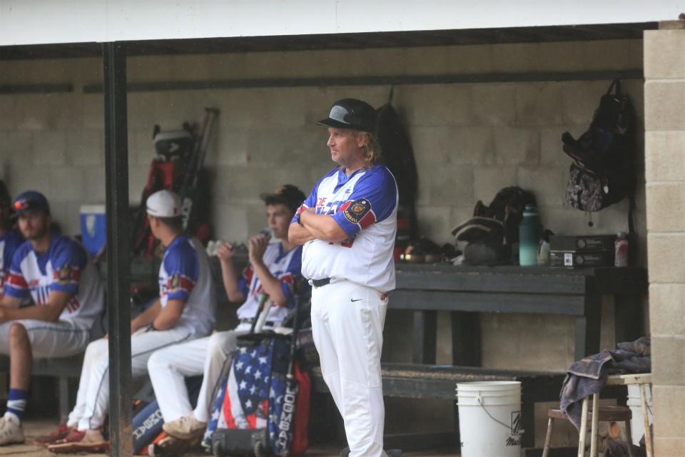 Head coach Ken Zvokel in the dugout as Muncie's American Legion Post 19 Chiefs advanced to the state tournament after going 2-0 in its regional round against Madison at Wapahani High School on Friday, July 15, 2022.