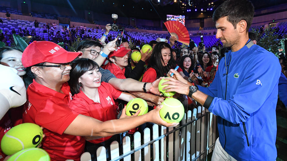 Novak Djokovic meets fans who watched his game in Margaret Court Arena. (Photo by James D. Morgan/Getty Images)