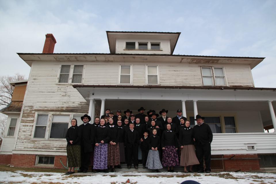 This undated image released by National Geographic Channels shows a Hutterite family in Lewistown, Mont. "Meet the Hutterites," a National Geographic documentary series about a small religious colony in rural Montana, debuts Tuesday, May 29. (AP Photo/National Georgraphic, Ben Shank)