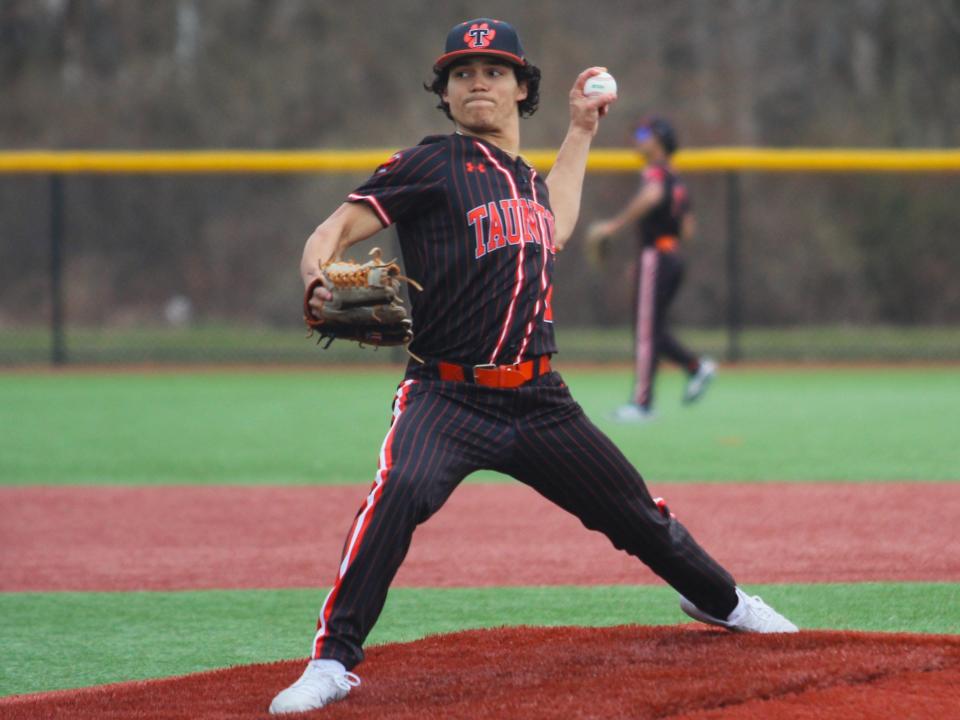 Taunton's Johnny Escobalez throws a pitch during a Hockomock League game against Sharon.